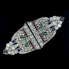 Art deco piece with synthetic rubies & sapphires.
